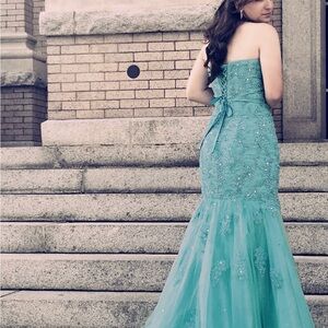 Blue embellished maxi gown with sequins and strapless neckline for prom